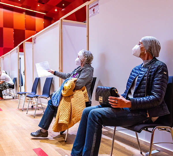 Two women sitting in chairs