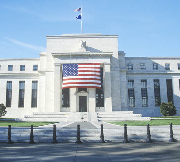 White brick building with American flag