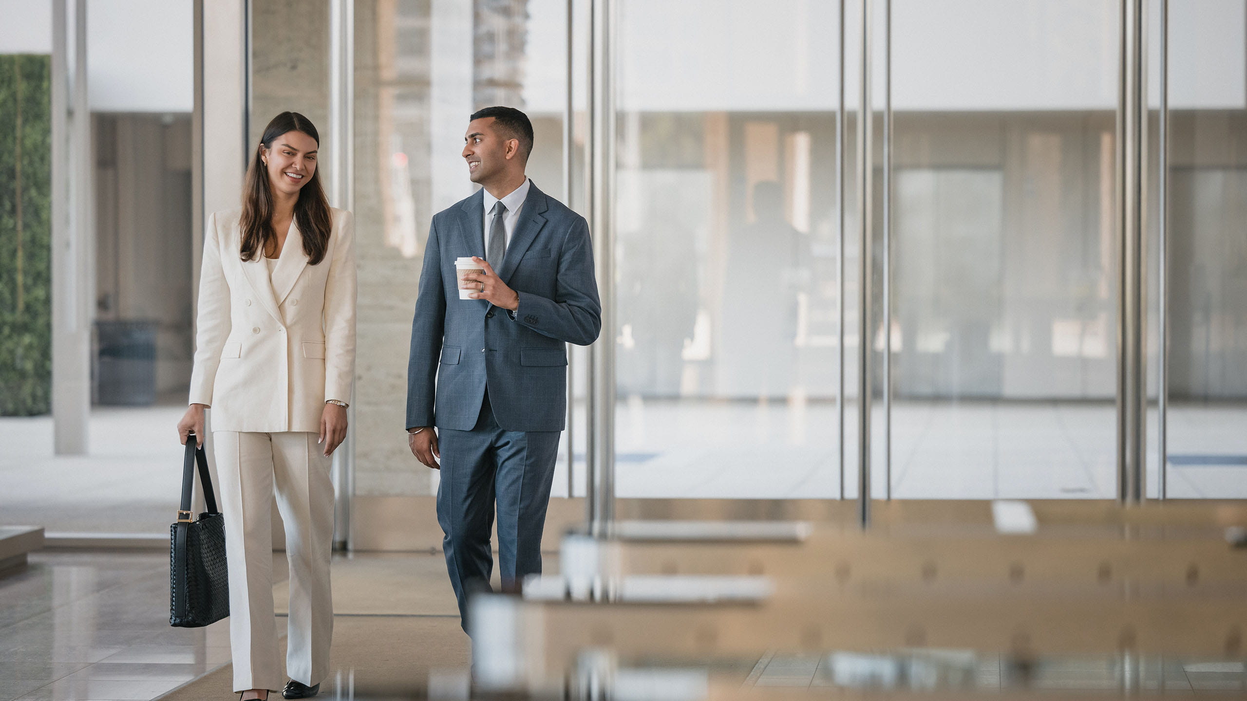 PIMCO interns walking outside and talking.