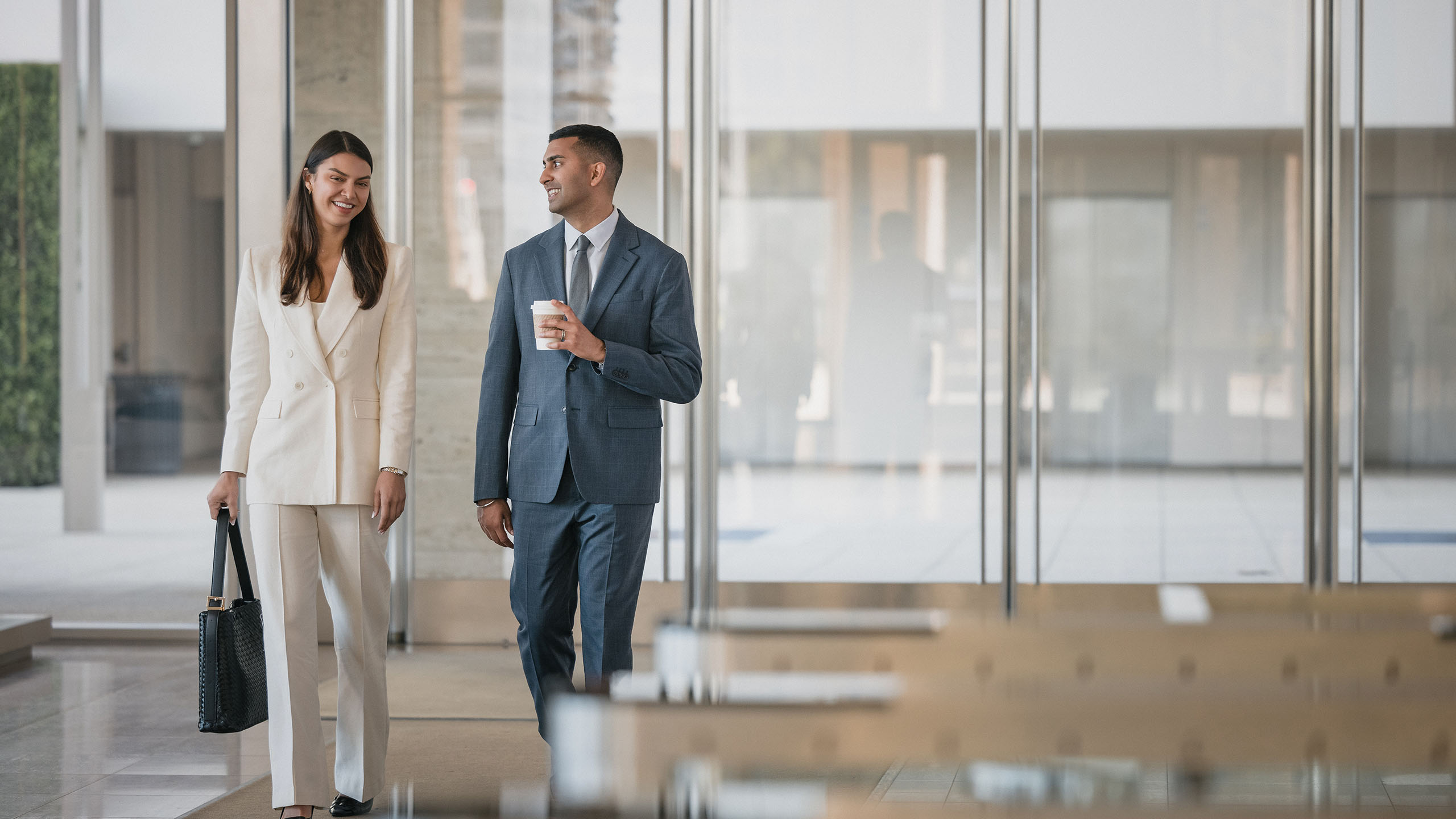 PIMCO interns walking outside and talking.